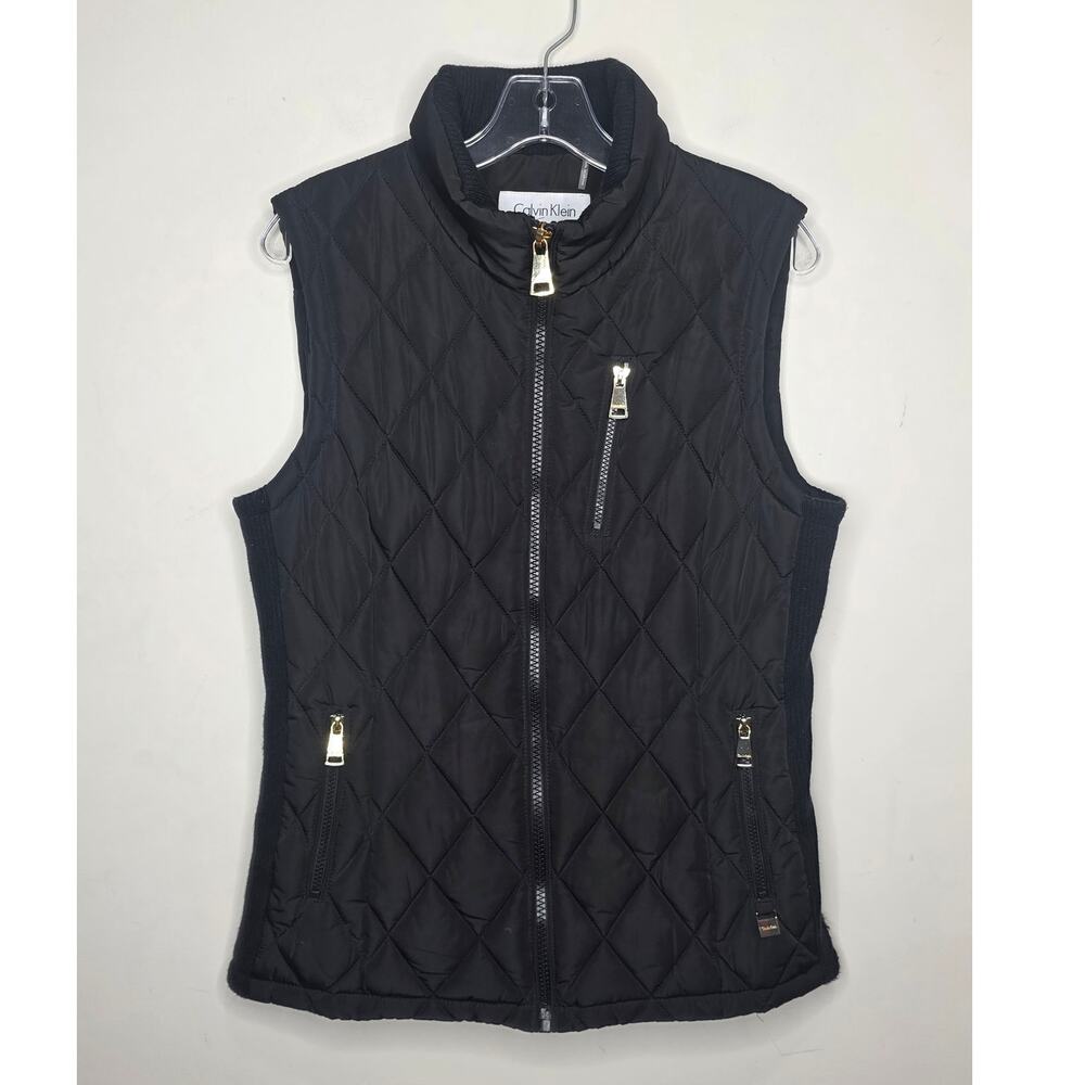 Calvin Klein black quilted puffer vest with gold zipper - medium